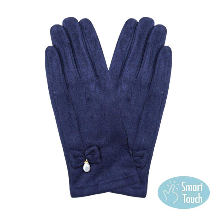 Navy Bow Pearl Dangle Pointed Faux Suede Smart Touch Gloves, these smart gloves designed for both stylish and practical use. With a smart touch feature, these gloves allow easy use of touchscreen devices. The faux suede material keeps your hands warm and comfortable, while the bow and pearl dangle add a touch of elegance.