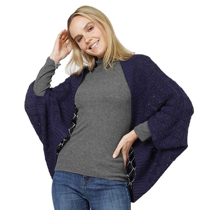 Navy Diamond Knit Shrug Vest, with the latest trend in ladies' outfit cover-up! The high-quality poncho is soft and comfortable. Stay protected from the chilly weather while taking your elegant looks to a whole new level with an eye-catching, luxurious casual outfit for women! A fantastic gift for your friends or family.