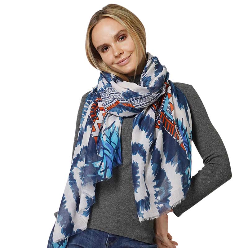 Navy Ethnic Printed Scarf, this timeless ethnic printed scarf is a soft, lightweight, and breathable fabric, close to the skin, and comfortable to wear. Sophisticated, flattering, and cozy. Look perfectly breezy and laid-back as you head to the beach. Perfect gift for birthdays, holidays, or fun nights out.