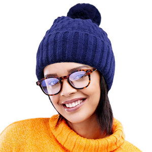 Navy Fleece Lining Solid Knit Faux Fur Pom Pom Beanie Hat, Stay warm and stylish this season with this hat. This classic hat is perfect for gifting, crafted with a solid knit and lined with soft fleece to provide superior warmth and comfort on cold days. Perfect winter accessory for outdoor activities.