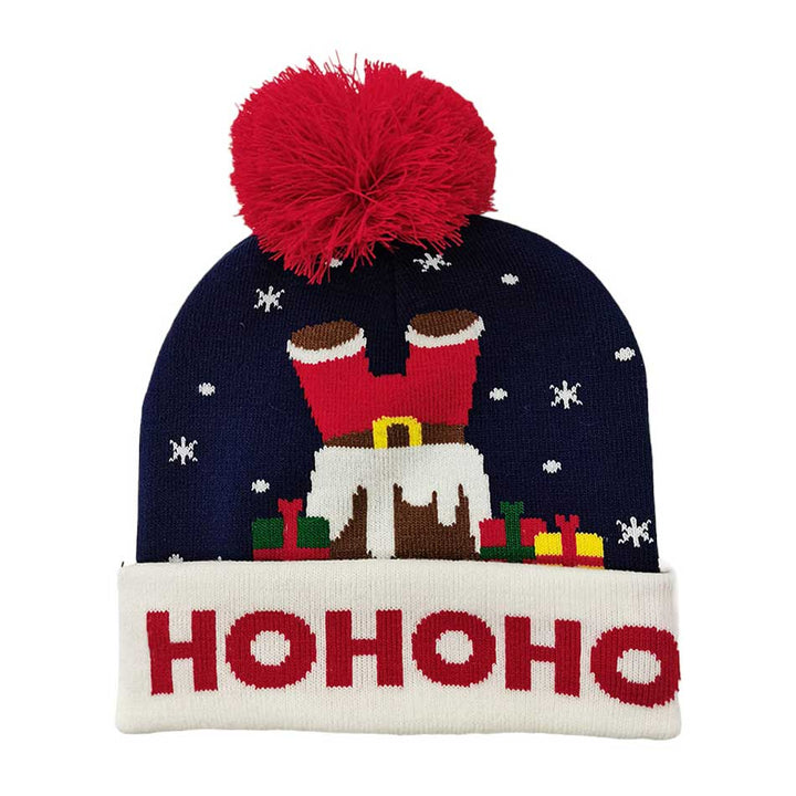 Navy HoHoHo Message Santa Claus Pom Pom Beanie Hat, is an ideal choice for gifting to your beloved ones in this Christmas season. The soft, comfortable material and cozy pom pom make this a stylish and comfortable choice. The festive, jolly "HoHoHo" embroidered patch provides a cheerful holiday touch.