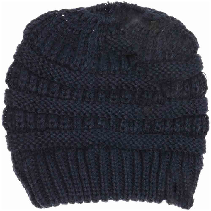 Navy Kids Solid Classic CC Beanie Tail combines timeless style with practical comfort. Designed with a soft, durable fabric, it provides warmth while allowing a ponytail or bun to fit through the open tail hole comfortably. Ideal for active children, this beanie ensures a secure and cozy fit during outdoor activities in cooler weather. Its solid color and classic design make it versatile for everyday wear or layering under helmets and hoods.