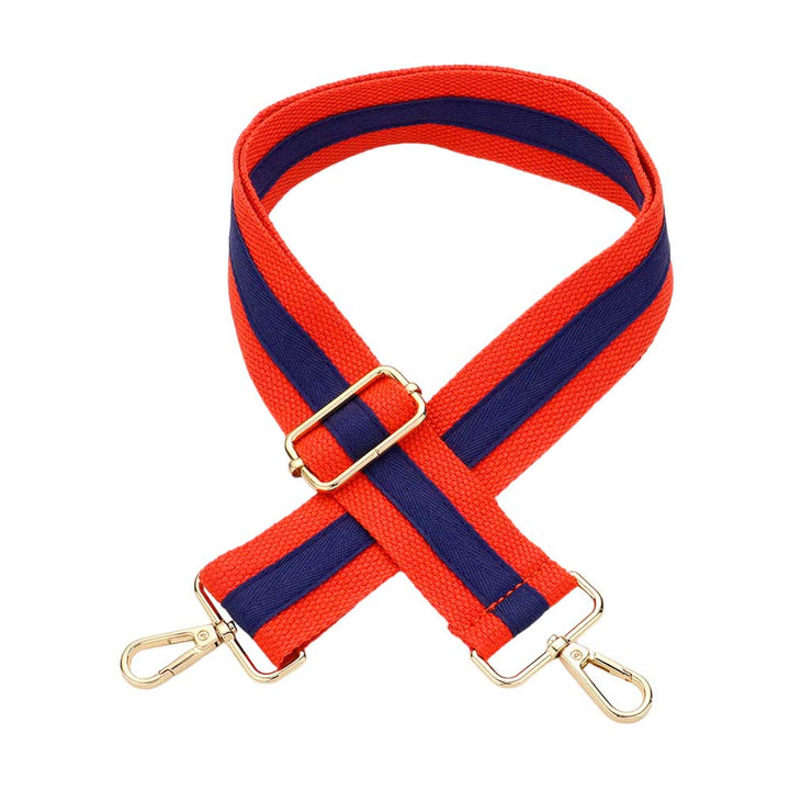 Navy Orange Game Day Color Block Bag Strap,  is an excellent addition to your game day look. This bag strap features a dynamic color block pattern in your team's colors, making it a striking and eye-catching accessory. The strap is fully adjustable, allowing you to wear it crossbody or over the shoulder for maximum comfort.