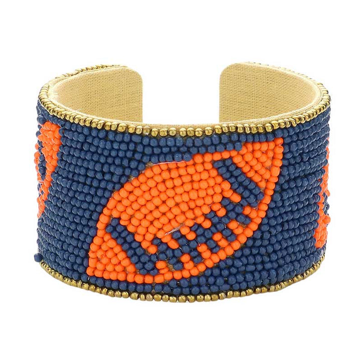 Navy Orange Game Day Seed Beaded Football Accented Cuff Bracelet, Show your love for the game with the Game Day Seed Beaded Football Accented Cuff Bracelet. It features a football design accent to create a unique and fashionable look. Perfect for any game day, this bracelet is sure to add a touch of team spirit to your wardrobe.