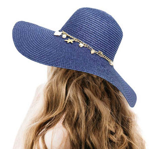 Navy Pearl Starfish Shell Charm Band Pointed Straw Sun Hat, is perfect for any beach or outdoor occasion. The beautifully crafted pearl and shell band adds a touch of glamour, while the pointed straw design provides ample shade and breathability. Stay stylish and protected from the sun with this must-have accessory. 
