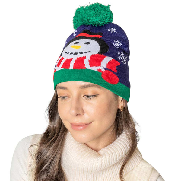 Navy Snowman Snowflake Pom Pom Beanie Hat, Stay warm and stylish with this hat! Crafted from a soft knit fabric, this beanie is warm and comfortable, perfect for winter activities. Ideal warming gift for young adults, fashion forwarded friends & family members, teenagers, fashion enthusiasts, and yourself on Christmas days.