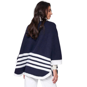Navy Sporty Bordered Zip Up Knit Cape Poncho, Crafted with a cozy acrylic-blend fabric, it features a zip-up front and generous hood for extra protection against the cold. The bold, bordered design adds a classic touch, making it the perfect piece for outdoor activities. A Perfect winter gift for any occasion