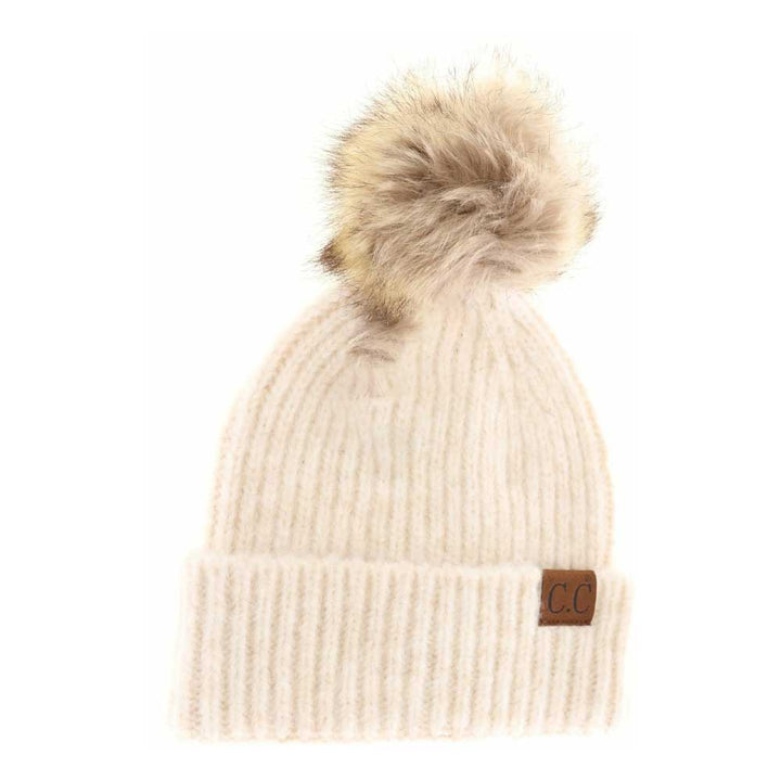 OatmealMulti Soft Ribbed Fur Pom C.C Beanie combines expert craftsmanship with functional warmth. Its soft ribbed knit fabric ensures a snug, comfortable fit while providing excellent insulation against the cold. Topped with a plush fur pom, this beanie adds a refined element to your winter wardrobe. Designed for durability and style, it’s an ideal accessory for professional and casual settings alike, offering reliable protection without compromising on appearance. 