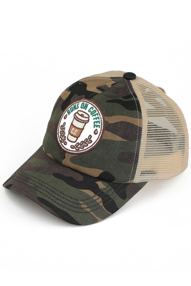 Olive Camo C.C RUNS ON COFFEE PATCH CRISS CROSS PONY CAP combines fashion with function, featuring a unique criss-cross design and a playful "Runs on Coffee" patch. Made with high-quality materials, this cap is perfect for those who want to show off their love for coffee while staying stylish and comfortable.