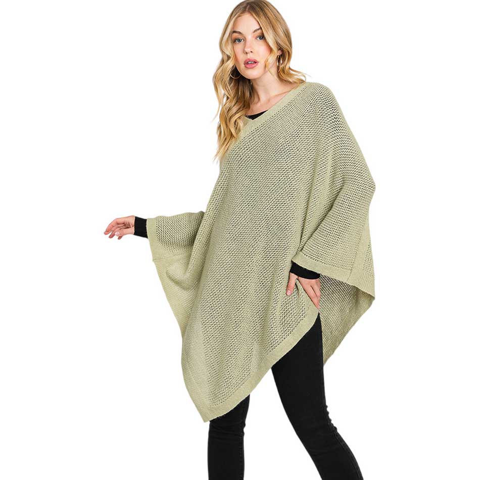 Olive Green Solid Knit Loose Fit Poncho, Crafted from a comforting, arctic wool blend fabric, features a loose-fitting design that will keep you cozy without compromising on style. Perfect for day-to-day wear. Look stylish and stay warm in this stylish poncho. It can be a stylish gift to family members or fashion loving friends.