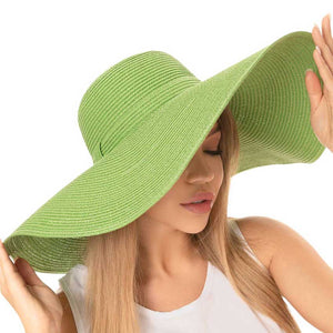 Olive Solid Floppy Straw Sun Hat, Stay stylish and protected from the sun with our sun hats! Made from high-quality straw, this hat is perfect for any sunny day. Its floppy design not only looks fashionable but also provides ample shade for your face and neck. Don't forget to pack this accessory for your next beach trip!