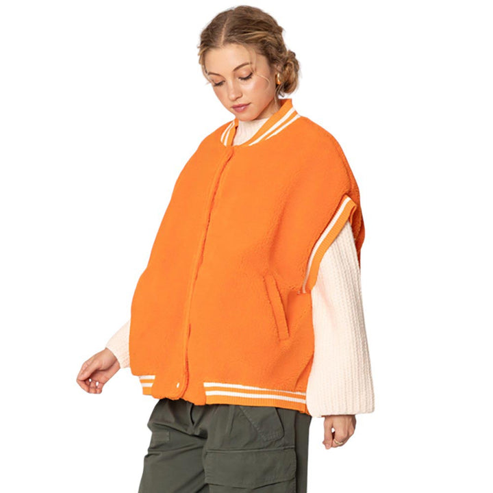 Orange-College Game Day Sherpa Vest, Made with warm and soft sherpa material, this vest is perfect for chilly game days. Represent your team in style and comfort, and stay warm while cheering them on to victory. Perfect for any college sports fan. A perfect way to finish off your winter wardrobe.