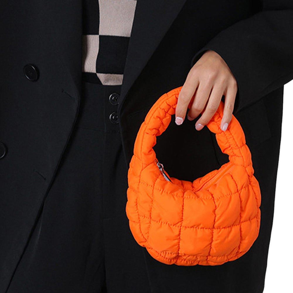 Orange Introducing the Micro Mini Quilted Puffer Hand Cloud Bag, a compact and stylish bag that will make you feel as light as a cloud! With its quilted puffer design, this bag is perfect for carrying essentials while making a fashion statement. It's a must-have for those who want to be both practical and fashionable.