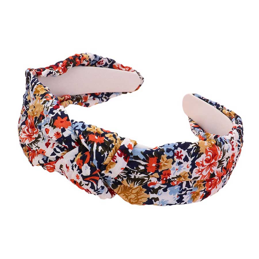 Orange Multi This Wild Flower Pattern Printed Knot Headband adds a stylish touch to any outfit with its intricate floral design. Made with high-quality material, it provides both comfort and durability. Perfect for a casual or formal look, it's the must-have accessory and an ideal gift for any fashion-forward individual.