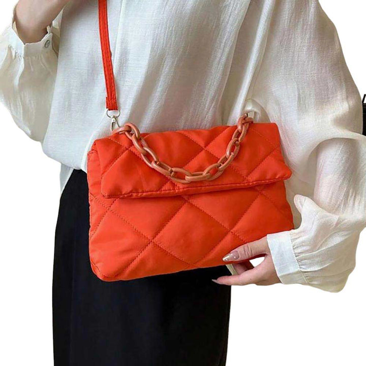 Orange Quilted Padded Flap Shoulder Bag Crossbody Bag, this bag is expertly crafted for both style and functionality. With its padded design and quilted detailing, this bag offers both a stylish and comfortable way to carry your essentials. The flap closure adds an extra layer of security, perfect for daily or occasional use.