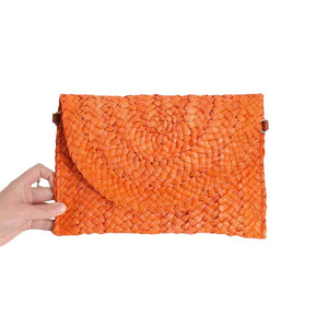 Orange Rattan Braided Clutch Bag, This vintage-inspired bag is handmade and eco-friendly. The intricate braided design adds a touch of bohemian style to your outfit. Made from sustainable materials, this bag is not only stylish but also environmentally conscious. Upgrade your accessory game with this unique clutch bag.