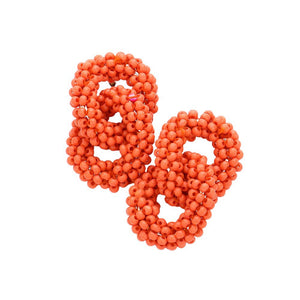 Orange Seed Beaded Double Open Circle Link Dangle Earrings, are a unique and stylish accessory that will add a visual effect to any outfit. The seed beads form feather-light circles that are linked together with a drop dangle design. Perfect for any occasion or everyday wear. Smart gift choice for friends and family members.