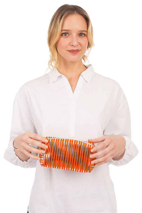 Stripe Pattern Pouch combines sleek design with practical functionality. Crafted with durable materials, it offers a stylish way to organize essentials, whether for travel or daily use. The distinctive stripe pattern adds a modern touch, making it a versatile accessory that complements any outfit or bag. Its compact size ensures easy portability without sacrificing storage space. Ideal for professionals seeking both elegance and convenience in their everyday carry. 