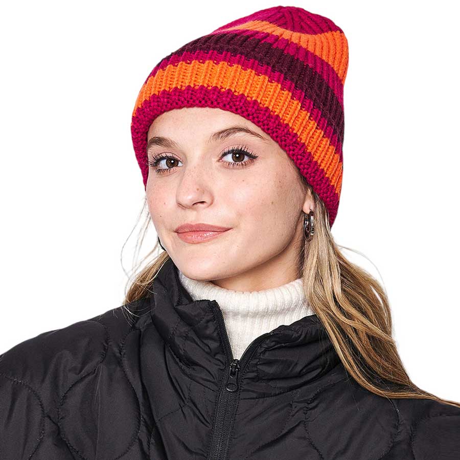 Orange Striped Cuff Beanie Hat, is a perfect accessory for the colder months. Crafted from acrylic and polyester materials, this beanie provides maximum warmth without compromising on style. Its unique striped cuff design ensures comfort and a standout look. Stay warm and look stylish with the Striped Cuff Beanie Hat.