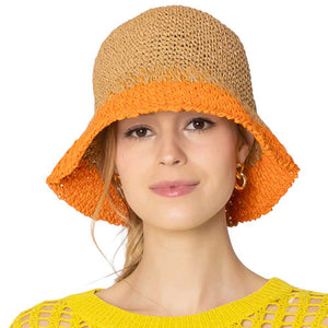 Orange Two-Tone Straw Bucket Hat, Stay cool and stylish with the stylish summer hat. This quirky hat features a unique two-tone design that adds a touch of fun to any outfit. Keep the sun out of your eyes while adding a playful flair to your look. Perfect for a day at the beach or a casual outing.