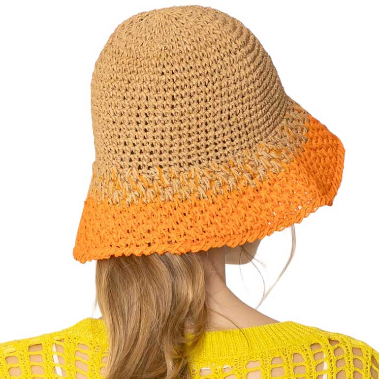 Orange Two-Tone Straw Bucket Hat, Stay cool and stylish with the stylish summer hat. This quirky hat features a unique two-tone design that adds a touch of fun to any outfit. Keep the sun out of your eyes while adding a playful flair to your look. Perfect for a day at the beach or a casual outing.