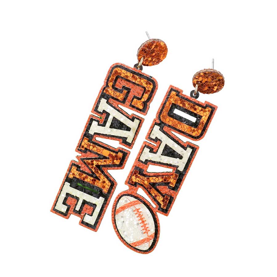 Orange White Game Day Message Football Bling Dangle Earrings, feature a sparkling crystal football and message charms with a metallic finish. Show your team spirit with these whimsical earrings. The perfect accessory for the biggest game days and the perfect gift for sports lovers. 