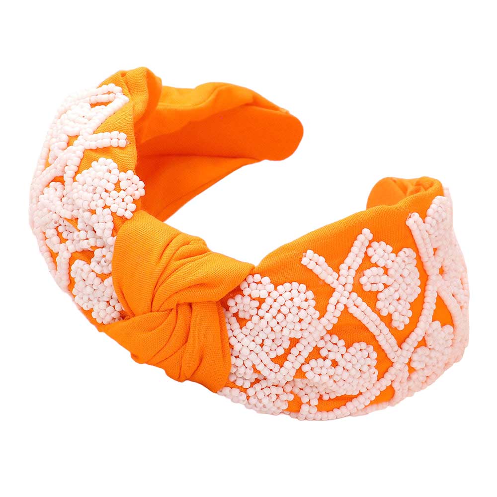 Navy Orange Be ready for game day with this stylish and comfortable Game Day Seed Beaded Paw Knot Burnout Headband. This headband is made from lightweight polyester and features a burnout design of paw knots with seed beads. Perfect for everyday wear, it's sure to make a statement and show your team spirit. 
