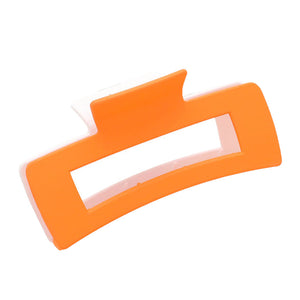 Orange Game Day Two Tone Open Rectangle Hair Claw Clip, is perfect for keeping your locks in place. This professional-grade clip features a firm grip clamp that ensures your hair stays put all day long. Made from high-quality materials, this clip is sure to last. Perfect gift for sports lovers to show their team spirit.