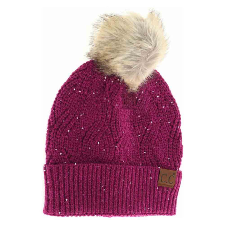 Orchid Flower Sequin Brioche Cable Knit Fur Pom C.C Beanie combines classic craftsmanship with a modern touch. Featuring a soft brioche cable knit pattern enhanced by subtle sequins, this beanie adds understated sparkle to cold-weather style. The plush fur pom enhances warmth and a refined aesthetic, making it an ideal accessory for both functionality and fashion during chilly days. Durable and comfortable, it delivers expert-level design that complements any winter wardrobe. 