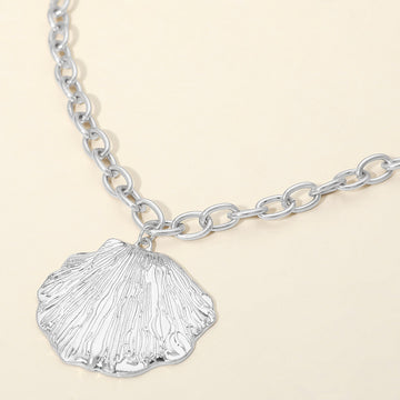 Madeline Love Worn Silver Textured Metal Seashell Pendant Necklace - Necklaces