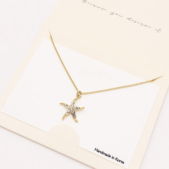 Madeline Love Gold Rhinestone Embellished Starfish Pendant Necklace - Necklaces