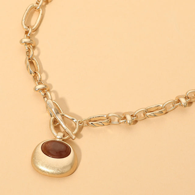 Madeline Love Brown, Worn Gold Chunky Pendant Accent Toggle Necklace