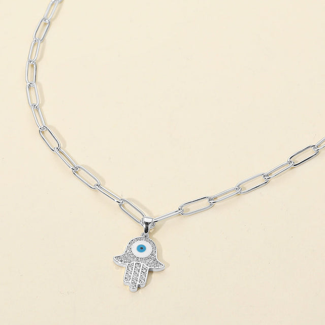 Madeline Love Silver Stainless Steel CZ Stone Paved Evil Eye Hamsa Hand Pendant Paperclip Chain Necklace - Jewelry