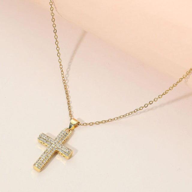 Madeline Love Clear, Gold Stainless Steel CZ Stone Paved Cross Pendant Necklace