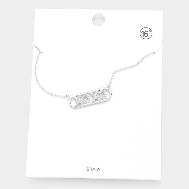 Madeline Love Rhodium XOXO Brass Metal Rhinestone Embellished Message Pendant Necklace - Necklaces