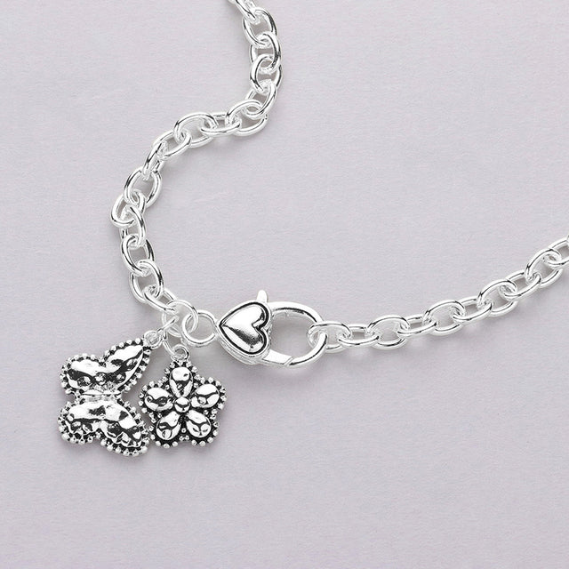 Madeline Love Antique Silver Antique Metal Butterfly Flower Pendant Necklace - Necklaces