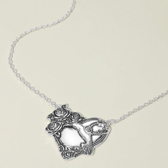 Madeline Love Antique Silver Antique Metal Rose Embossed Heart Pendant Necklace - Necklaces