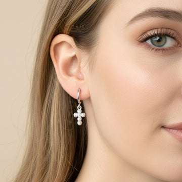 Madeline Love Silver, White Gold White Gold Dipped Center Pearl Cross Charm Drop Mini Huggie Hoop Earrings