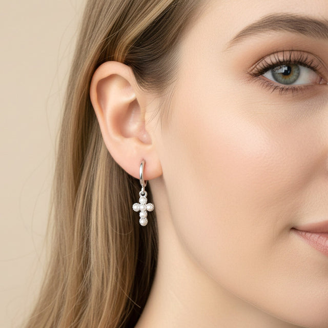 Madeline Love Silver, White Gold White Gold Dipped Center Pearl Cross Charm Drop Mini Huggie Hoop Earrings