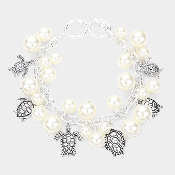 Madeline Love Antique Silver, Cream Antique Metal Turtle Charm Station Pearl Toggle Bracelet - Bracelets