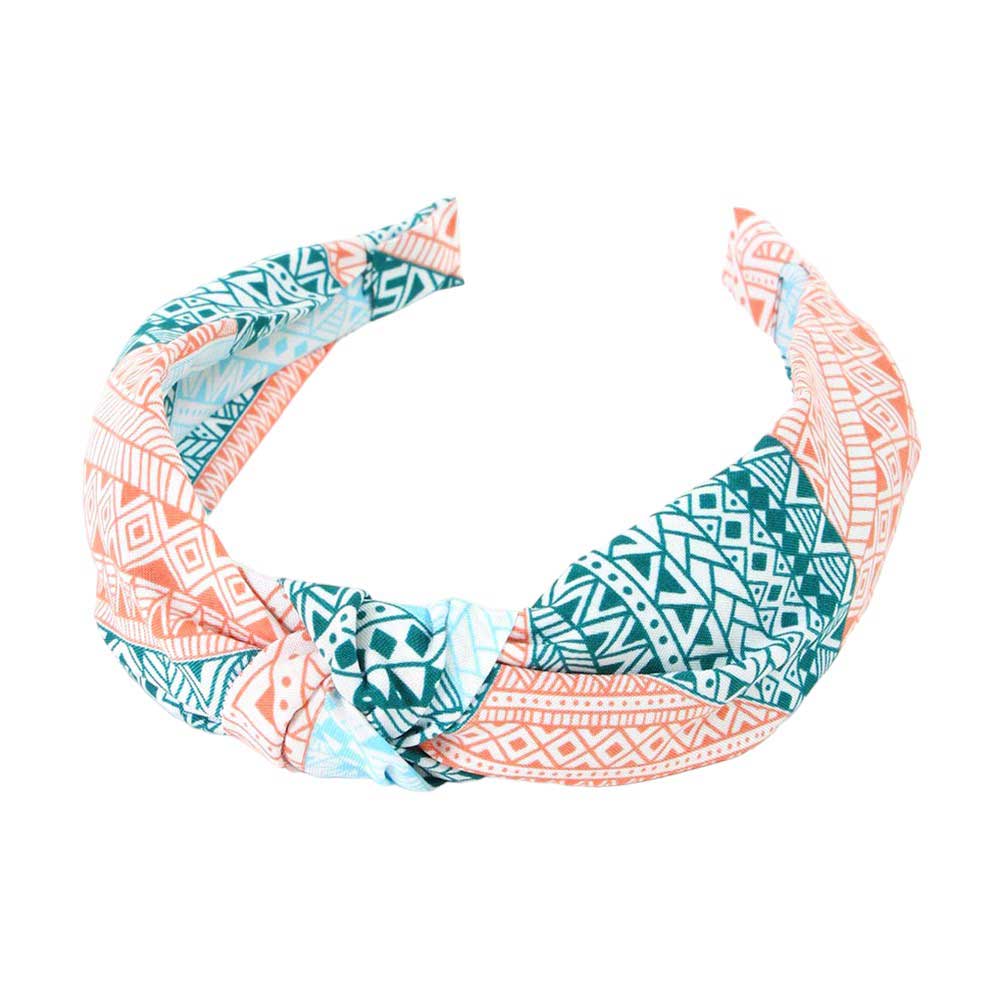 Peach Aztec Patterned Burnout Knot Headband is expertly crafted and features a unique design. Its trendy Aztec pattern and comfortable knot design are perfect for adding a touch of style to any outfit. Made with high-quality materials, it provides both functionality and fashion.