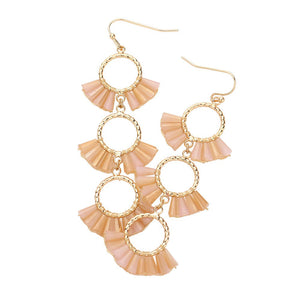 Peach Beaded Triple Hoop Dropdown Dangle Earrings, are an eye-catching accessory. With three interlocking rings, each beaded with vibrant colors, this earring set provides a perfect accent to any outfit. Lightweight and fashionable, these earrings can be dressed up or down, making them suitable for any occasion.