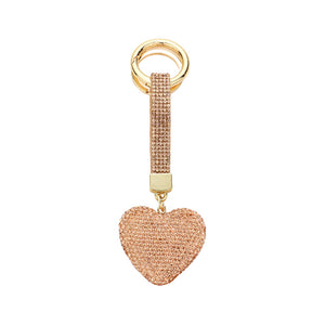 Peach Bling Heart Keychain, is beautifully designed with a heart-themed stone design that will make a glowing touch on one's heart whom you care about & love. Crafted with durable materials, this accessory shines and sparkles. It's an excellent gift for your loved ones to make their moment special.