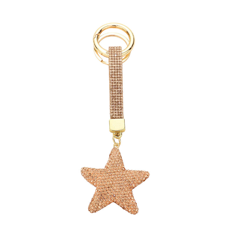 Peach Bling Star Keychain, is beautifully designed with a Star-themed stone design that will make a glowing touch on one's Star whom you care about & love. Crafted with durable materials, this accessory shines and sparkles. It's an excellent gift for your loved ones to make their moment special.