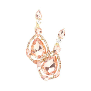 Peach Crystal Rhinestone Teardrop Evening Earrings, are beautifully crafted with glimmering crystal rhinestones and a teardrop design that adds elegance and charm to your look. They are the perfect accessory for adding a touch of glamour to any special occasion. A quintessential gift choice for loved ones on any special day.