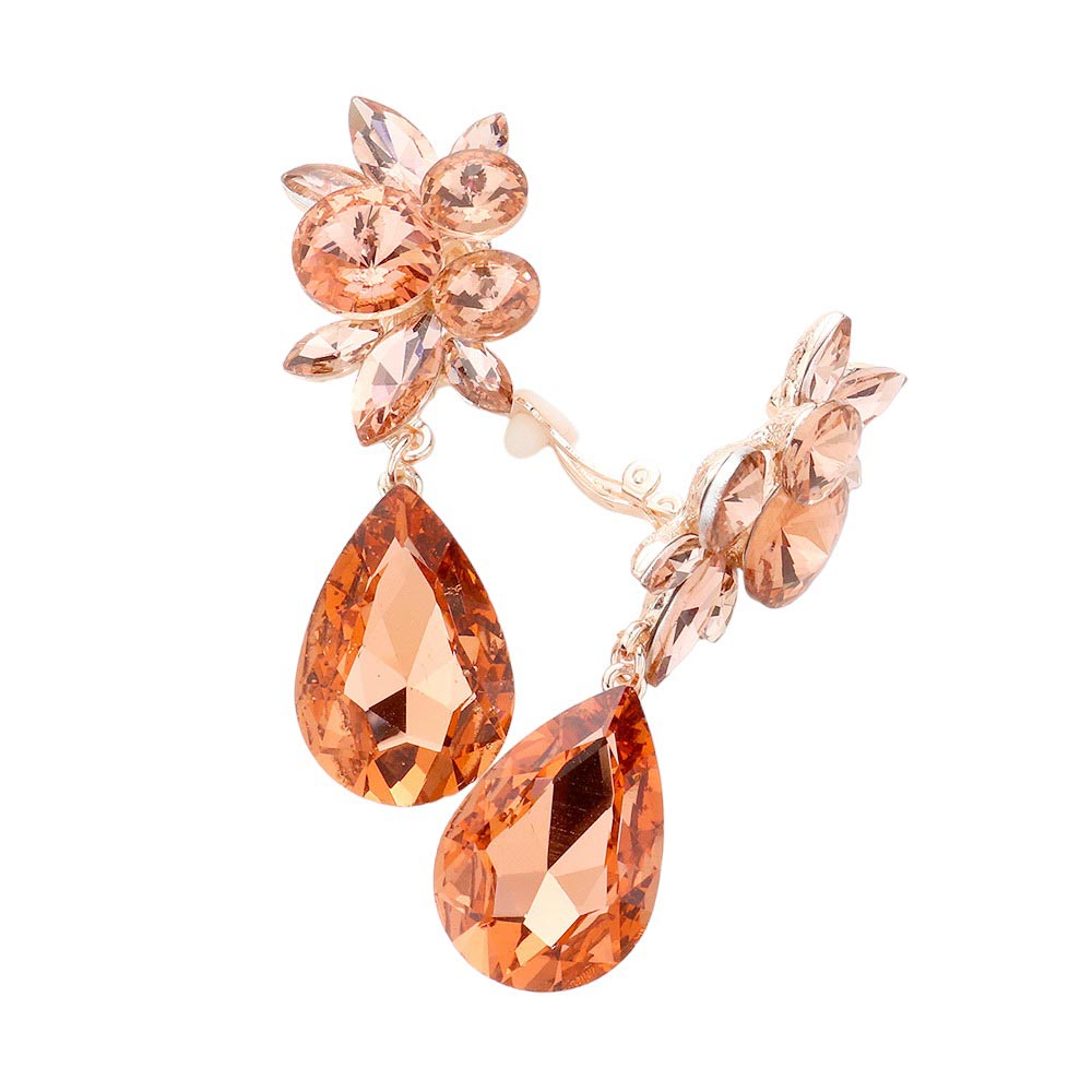 Peach Glass Crystal Teardrop Clip On Earrings, add a touch of sparkle to any outfit. Crafted with lead-free glass crystals, they feature a tear-drop design and secure clip-back fastening for a comfortable fit. Perfect for any special occasion or as an exquisite gift to someone you love. 