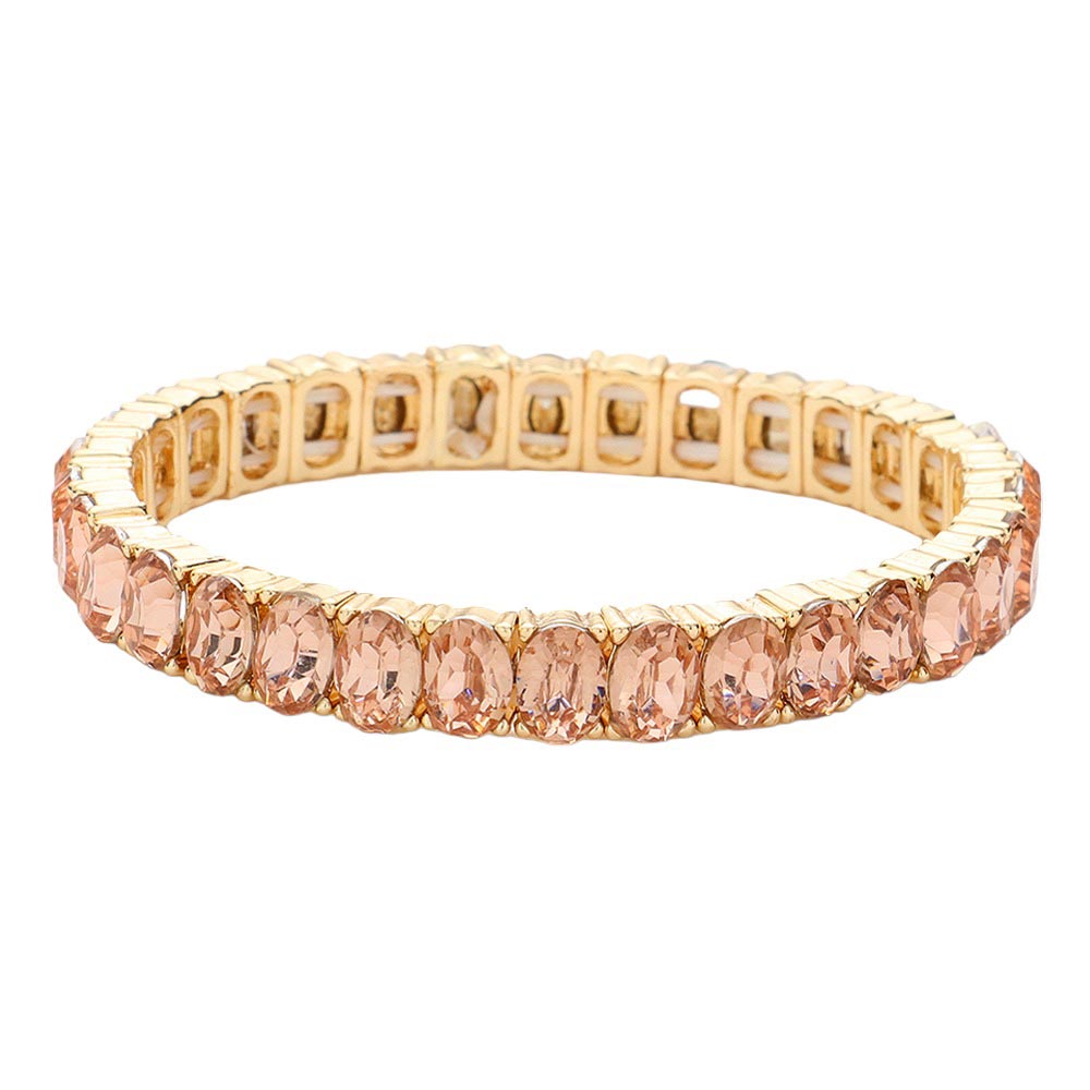 Peach Oval Stone Cluster Stretch Evening Bracelet, an exquisite piece of jewelry with beautiful oval-shaped stones arranged in a cluster. Crafted with a stretchable elastic band, this bracelet provides a comfortable fit for any size wrist. A stunning accessory for a special occasion. Perfect gift choice for someone you love.