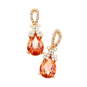 Peach Teardrop Crystal Rhinestone Evening Earrings, are the perfect accessory for any special occasion. Each earring features a teardrop-shaped crystal encrusted in rhinestones for a glamorous sparkle and shine. High-quality stones are set securely in the design. A timeless gift piece that will sparkle for years.