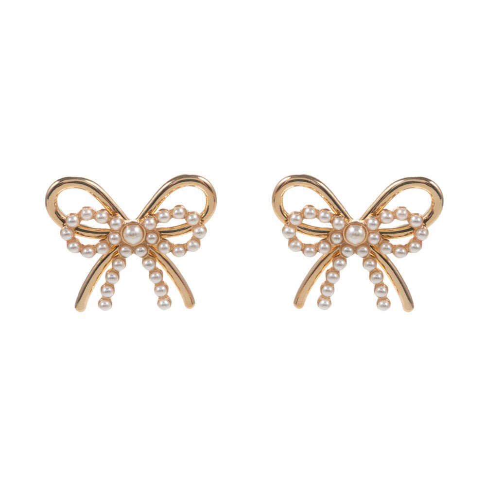 Pearl Metal Bow Earrings are the perfect addition to your jewelry collection. Made with high-quality metal and adorned with stunning pearls, these earrings offer a timeless and elegant look. The delicate bow design adds a touch of femininity to any outfit. Upgrade your accessory game with these beautiful earrings.