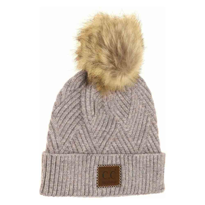 PeriwinkleMix Large Patch Heathered Pom Beanie combines classic style with practical warmth. Crafted from a soft, heathered knit fabric, it offers comfortable insulation for cooler days. The prominent patch detail adds a distinctive, refined touch while the pom keeps the look timeless. Ideal for outdoor activities or casual wear, this beanie provides reliable protection against the cold without compromising on style. 